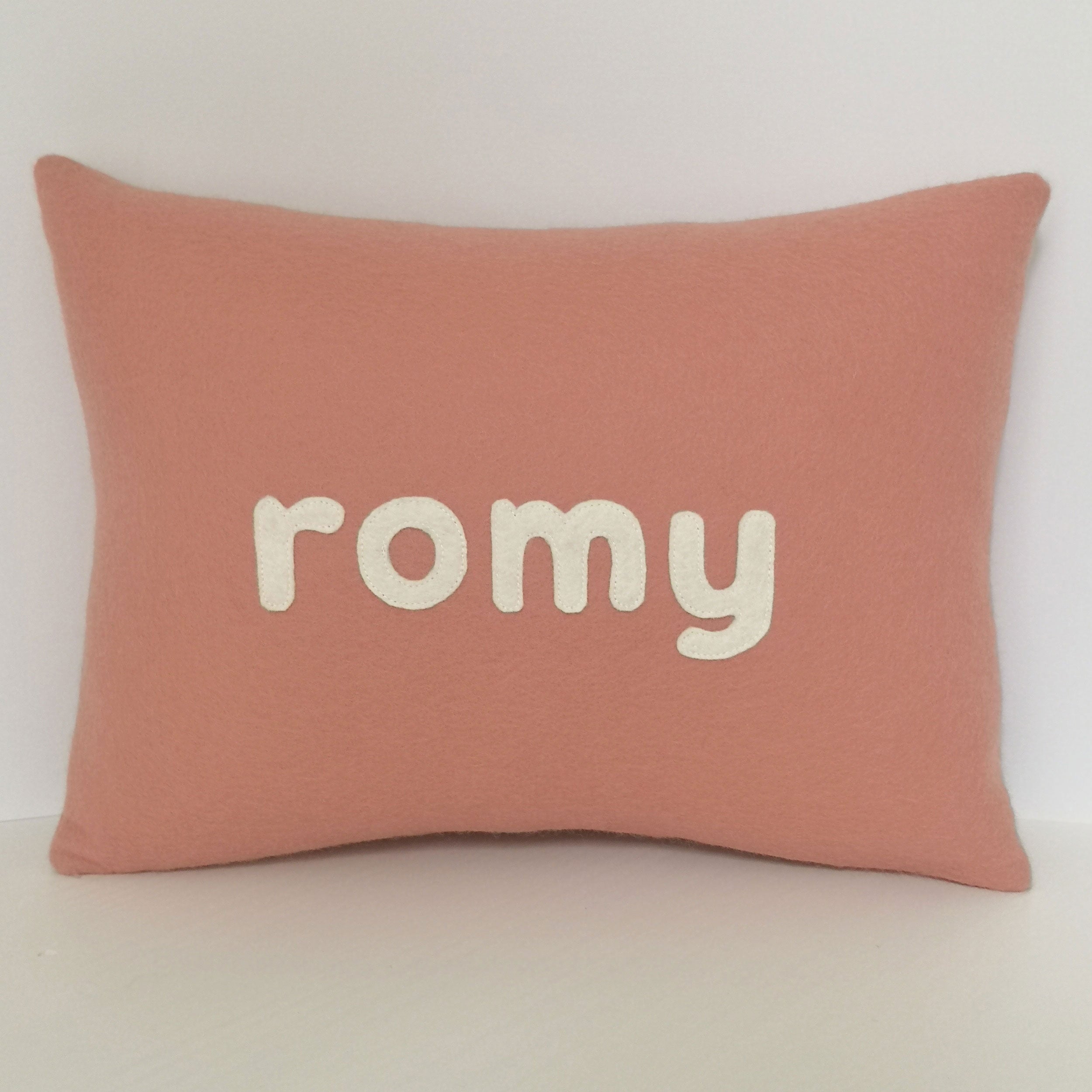 personalised cushion with name in pink coral wool felt