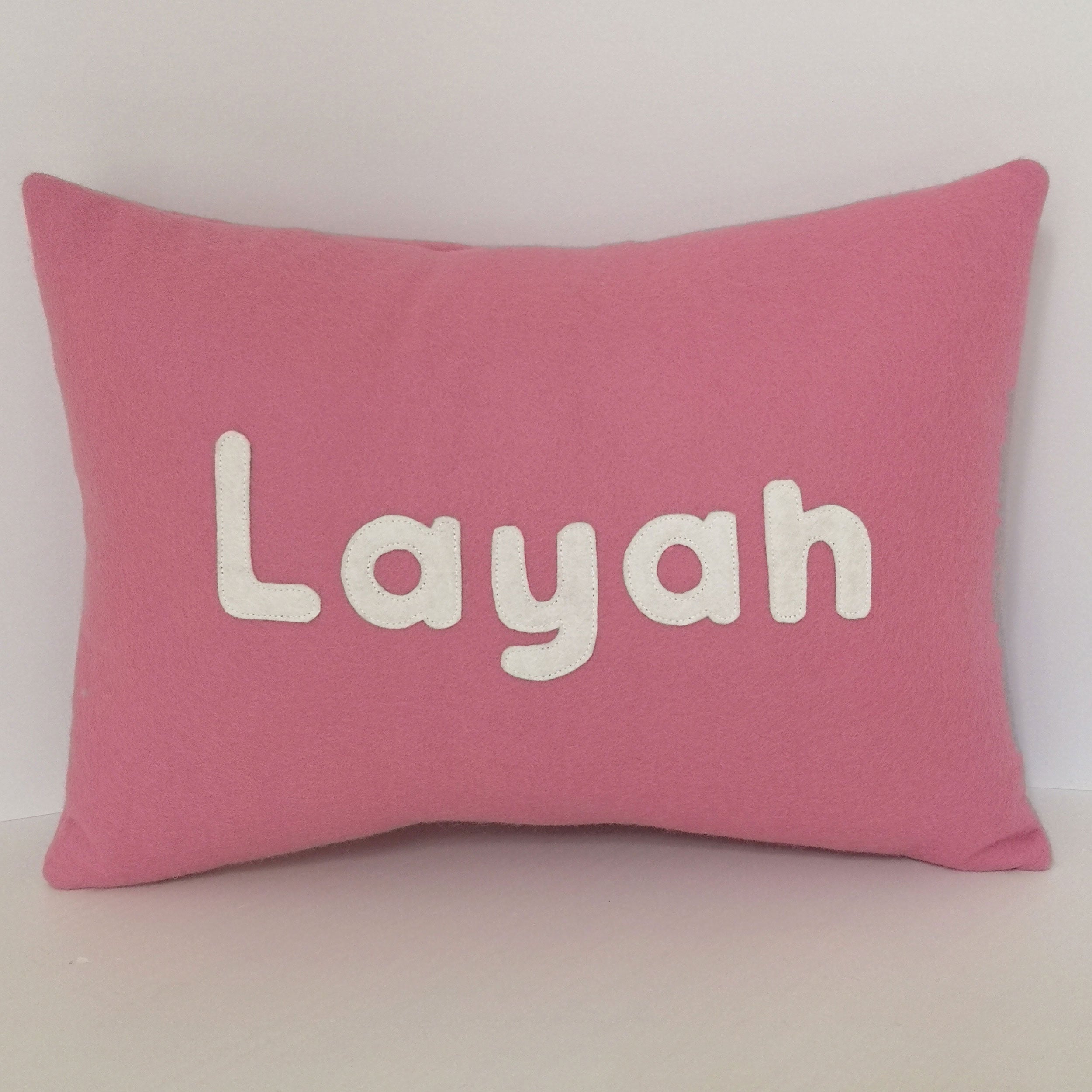 personalised cushion with name in pink wool felt